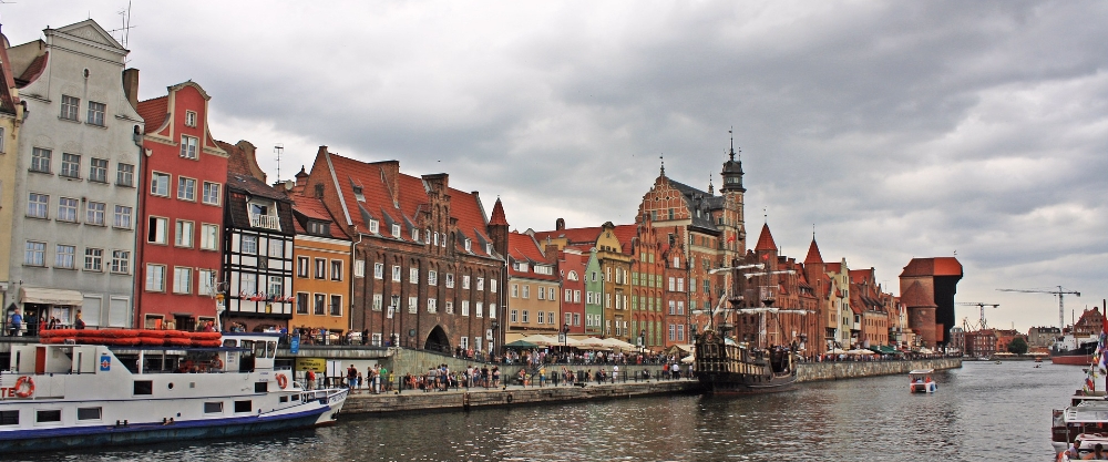 Traditional façades and the quay in Gdańsk, capturing the historical essence of this university city in northern Poland.